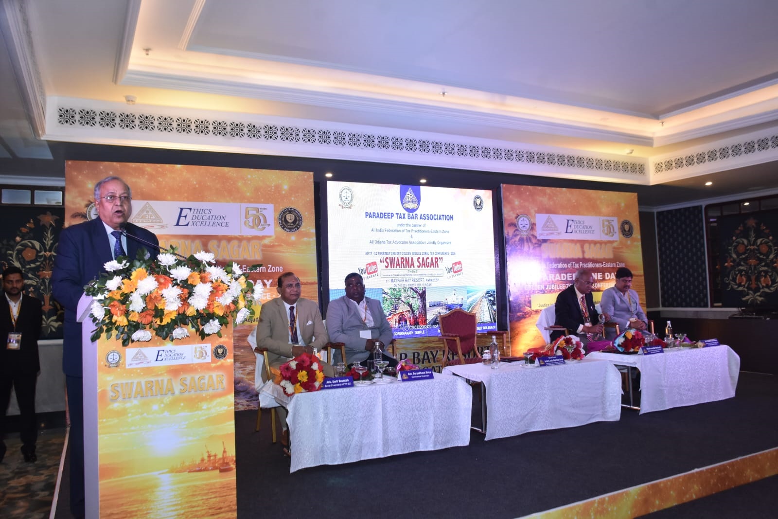 Chief Guest Hon’ble Justice Bidyut Ranjan Sarangi addressing the session. Sitting: Left to Right-EZ Chairman Smit Sourabh, Conference Chairman Duryodhan Rana, NVP Sr. Bibekananda Mohanti, Conference Secretary and AOTTA Secretary and Zone State Coordinator Prashant Kumar Mishra
