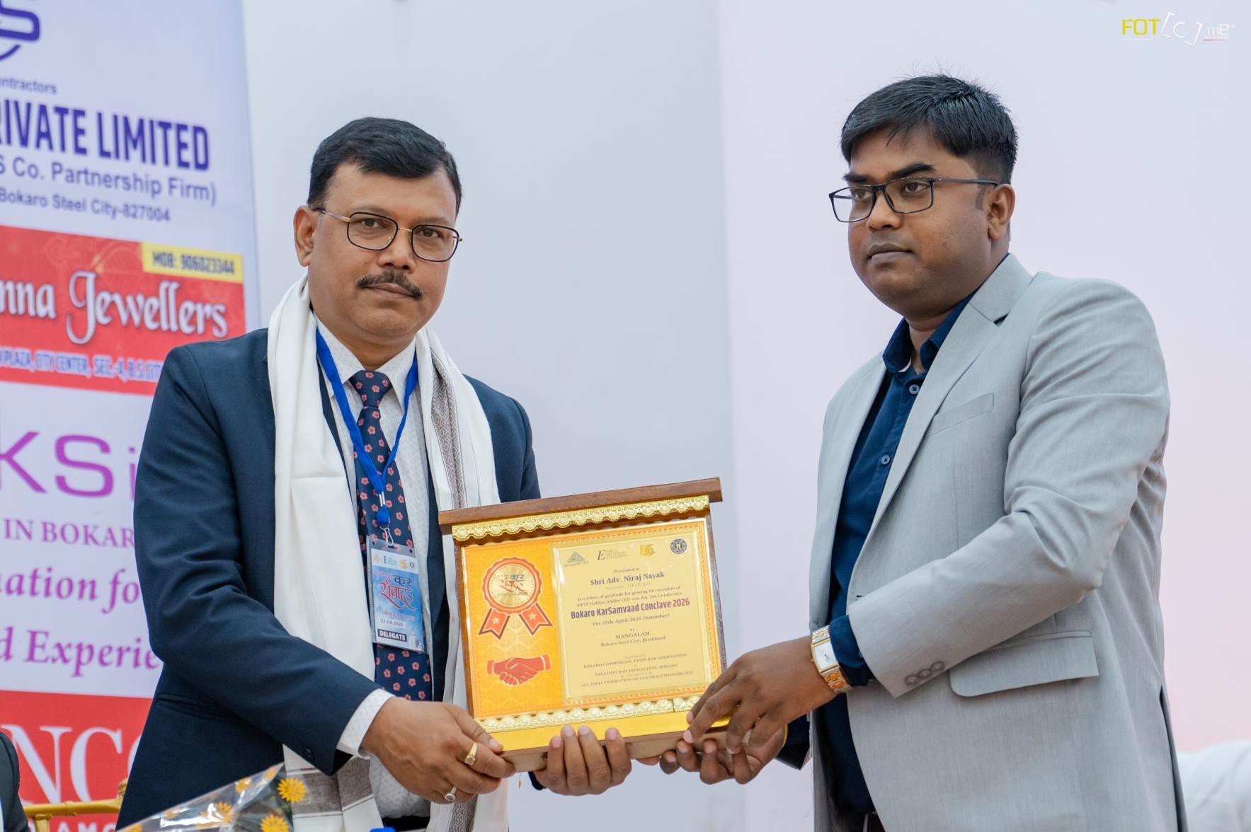 Felicitation of Zone Secretary Niraj Kumar Nayak by CA Kishor Kumar Mandal during the Inaugural session.